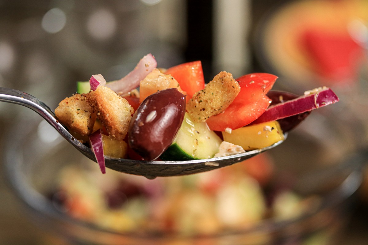 Gluten-free Greek Salad close up on a school